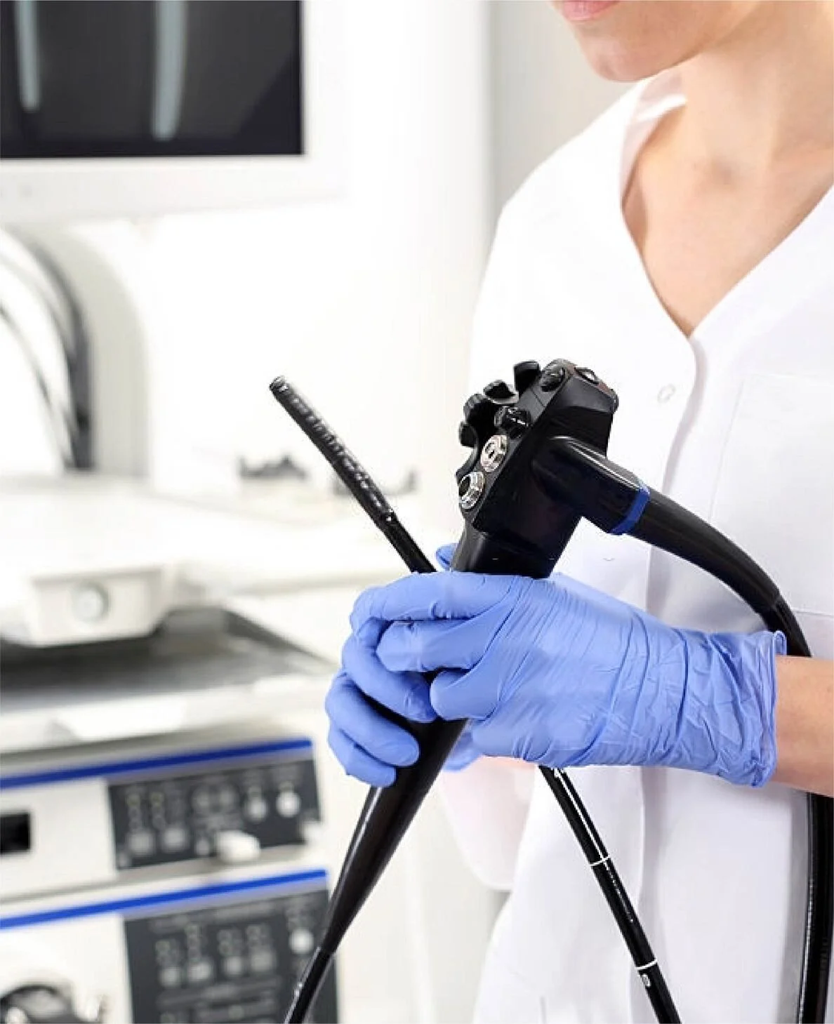 Clinician preparing endoscopy equipment